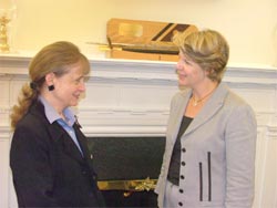 Harriet Miers, left, speaks with Margaret Spellings in the Chief of Staff's office.