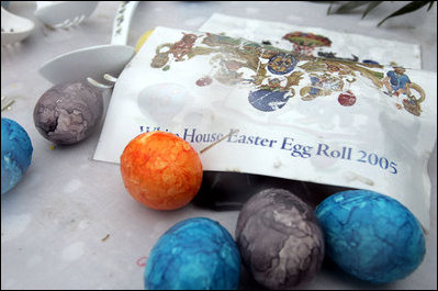 Rain swirls with Easter egg dye to create intricate patterns on a few of the more than 10,000 eggs prepared for the 2005 White House Easter Egg Roll.