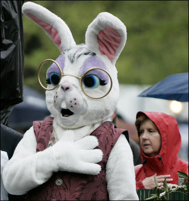 A character Easter rabbit places its hand over its heart during the playing of the National Anthem on the South Lawn of the White House during the 2006 White House Easter Egg Roll, Monday, April 17, 2006.