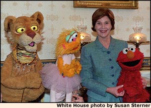 Photo of Mrs. Bush and PBS muppets. White House photo by Susan Sterner.