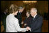 President George W. Bush and first lady Laura Bush are greeted upon their arrival to Quirinale Palace by Italy's President and first lady, Carlo and Franca Ciampi, Thursday, April 7, 2005. President and Mrs. Bush paid the courtesy visit while in Rome for the funeral of Pope John Paul II.