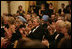 President George W. Bush, Laura Bush and India Prime Minister Dr. Manmohan Singh and Mrs. Gursharan Kaur, applaud the entertainers appearing Monday, July 18, 2005 at the official dinner at the White House.