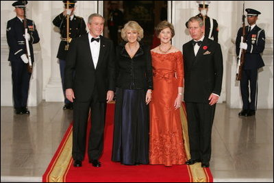 President George W. Bush and Laura Bush welcome the Prince of Wales and Duchess of Cornwall upon their arrival to the White House, Wednesday evening, Nov. 2, 2005.