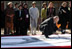 A calligrapher at the Beomeosa Temple in Busan entertains the spouses of APEC leaders Friday, Nov. 18, 2005, during the two-day summit.