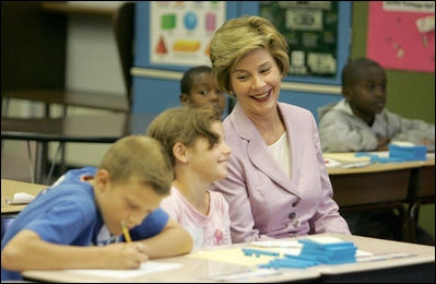 Laura Bush observes a fifth grade math class at Lovejoy Elementary School in Des Moines, Iowa, Thursday, September 8, 2005.