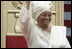 Liberian President Ellen Johnson Sirleaf waves to the audience at her inauguration in Monrovia, Liberia, Monday, Jan. 16, 2006. President Sirleaf is Africa's first female elected head of state. Mrs. Laura Bush and U.S. Secretary of State Condoleezza Rice attended the ceremony.