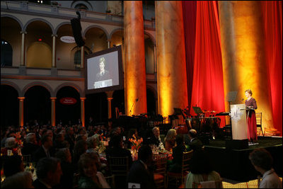 Mrs. Laura Bush addresses the guests at the Mosaic Foundation dinner in the National Building Museum in Washington, D.C., Wednesday, May 9, 2006. Founded by the spouses of Arab Ambassadors to the United States, the Mosaic Foundation is dedicated to improving the lives of women and children.