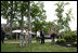 President George W. Bush and Australian Prime Minister John Howard participate in the presentation of White House trees at the Australian Ambassador's Residence, Sunday, May 14, 2006.