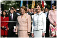 Mrs. Laura Bush and the wife of Australian Prime Minister John Howard Janette Howard stand during the State Arrival Ceremony on the South Lawn of The White House May 16, 2006.