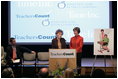 Mrs. Laura Bush stands with her second grade teacher, Charlene Gnagy, as Mrs. Gnagy speaks to the audience Thursday, October 5, 2006, during the TeachersCount "Behind every famous person is a fabulous teacher" PSA campaign launch ceremony in New York City. The campaign is to help create awareness for teachers and the role they play in the lives of children and to raise the status of the teaching profession.