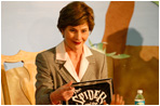 Mrs. Laura Bush visits the West Palm Beach Public Library in West Palm Beach, Fla.,where she reads "The Spider and the Fly" to children.