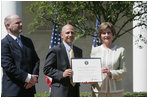 Mrs. Laura Bush presents a plaque to Craig Heller, center, president of Loftworks and John Steffen, left, president of Pyramid Construction, honoring them with a 2007 Preserve America Presidential Award in the Rose Garden at the White House Wednesday, May 9, 2007. The Steffen and Heller companies were honored for their work in preserving and revitalizing the historic downtown of St. Louis, Mo.
