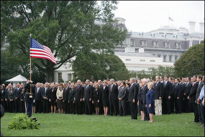 President George W. Bush and Mrs. Laura Bush are joined by Vice President Dick Cheney and Mrs. Lynne Cheney Tuesday, Sept. 11, 2007, on the South Lawn of the White House for a moment of silence in memory of those who died Sept. 11, 2001.