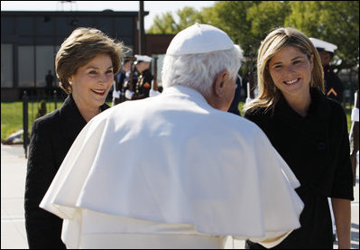 Mrs.Laura Bush and Jenna Bush greet Pope Benedict XVI on his arrival to Andrews Air Force Base, Md., Tuesday, April 15, 2008, the first stop of a six-day visit to the United States.