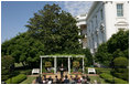Mrs. Laura Bush delivers remarks in honor of World Refugee Day Friday, June 20, 2008, in the East Garden of the White House. In addressing her guests, Mrs. Bush announced the approval by President George W. Bush of a $32.8 million emergency funding to support unexpected and urgent needs, including food, for refugees and conflict victims in Africa, the Middle East, Asia and the Western Hemisphere.
