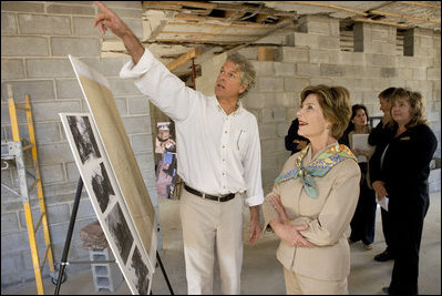 Mrs. Laura Bush views the restoration of the original home of Alexander Hamilton with Stephen Spaulding, National Park Service Chief of the Architectural Preservation Division, at what is now a part of the Hamilton Grange National Memorial in New York City, Sept. 24, The building was once the historic home of Alexander Hamilton. 