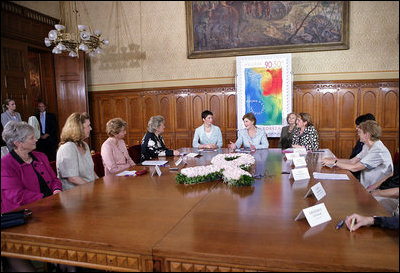 Mrs. Laura Bush and Dr. Klara Dobrev, wife of Hungarian Prime Minister Ferenc Gyurcsanys, participate in a roundtable discussion about breast cancer awareness in Budapest, Hungary, Thursday, June 22, 2006. White House photo by Shealah Craighead .