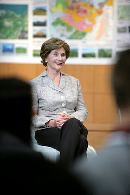 During the G8 Summit, Mrs. Laura Bush meets with Junior 8 (J8) delegates, aged 13-17, before a tour of the Volcano Science Museum at Toyako Town Visitor Center, Toyako, Japan. Wives of the other G8 leaders also attended the session where the J8 delegates had the opportunity to ask questions about global issues that concern young people, like climate change, HIV/AIDS and other infectious diseases, child survival, poverty and development – with a particular focus on Africa. The program, launched four years earlier by UNICEF, gives 39 young people representing the G8 countries and the developing world an opportunity to debate issues faced by children in a week-long forum that allows the kids to work together in teams of four and to be heard. Previous J8 meetings have been in the United Kingdom, Russia and Germany.