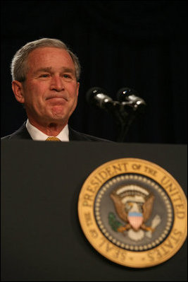 President George W. Bush acknowledges the applause as he attends the 56th National Prayer Breakfast Thursday, Feb. 8, 2008, at the Washington Hilton Hotel. Said the President, "Every President since Dwight Eisenhower has attended the National Prayer Breakfast -- and I am really proud to carry on that tradition. It's an important tradition, and I'm confident Presidents who follow me will do the same. The people in this room come from many different walks of faith. Yet we share one clear conviction: We believe that the Almighty hears our prayers -- and answers those who seek Him."