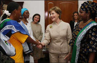 Mrs. Laura Bush is welcomed on her arrival to the WAMA Foundation Sunday, Fab. 17, 2008 in Dar es Salaam, Tanzania, for a meeting to launch the National Plan of Action for Orphans and Vulnerable Children.