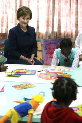 Mrs. Laura Bush visits with young patients at Maputo Central Pediatric Day Hospital Wednesday, June 27, 2007, in Maputo, Mozambique. “It is terrific to be here at the Pediatric Day Hospital; I was thrilled to see the beautiful artwork that the children created to express their ideas and feelings, and I enjoyed meeting the mothers of those children in the Positive Tea support group,” said Mrs. Bush to the press during her visit to the hospital. “The positive Tea support group is a great opportunity for mothers to come together and discuss their concerns and questions.”