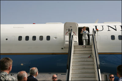 Mrs. Laura Bush waves as she arrives at Kabul International Airport, Sunday, June 8, 2008. Mrs. Bush traveled to Afghanistan to highlight the continued U.S. commitment to the country and its President Hamid Karzai.