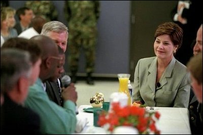 Mrs. Bush talks with teachers at Pinckney Elementary School in Columbia, South Carolina during a visit to Fort Jackson for a Troops to Teachers rally May 8, 2001.