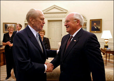 President Gerald Ford talks with Vice President Dick Cheney in the Oval Office July 16, 2003. The Vice President served as the former President's Chief of Staff.