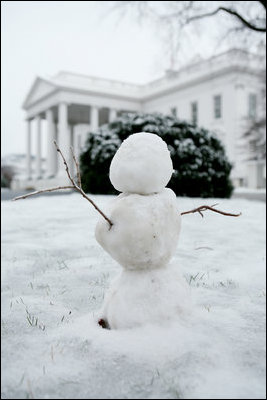 A small snowman is seen created on the north grounds of the White House Monday, Jan. 22, 2007, following a winter snowstorm that blanketed the Washington, D.C. area Sunday.