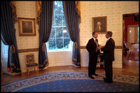 Before delivering his address to Congress and the nation following the attacks of September 11, President George W. Bush speaks with British Prime Minister Tony Blair in the Blue Room, Sept. 20, 2001