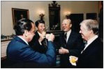 President Ronald Reagan hosts former Presidents Ford, Nixon and Carter as they share a laugh in the Blue Room October 8, 1981. Since the opening of the White House in 1800, presidents and first ladies have used the Blue Room to formally receive and greet guests.