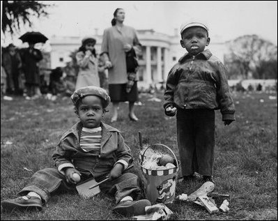 Children enjoy eggs and goodies from the Easter Egg Roll in 1953, the year President Eisenhower reintroduced this tradition to a whole generation of children had never experienced it. From 1942 to 1953, the Easter Egg Roll had it longest hiatus due to World War II, followed by a White House renovation. 