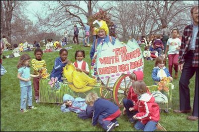 Children pose with a clown and decorations at the 1980 White House Easter Egg Roll. In 1980, Rosalynn Carter passed out 10,000 souvenir plastic eggs welcoming visitors with a little message inside.