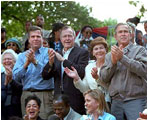The Bush family enjoys a game of tee ball on the White House lawn on June 3, 2001. From left to right are Barbara Bush, Florida Governor Jeb Bush, former President George H.W. Bush, Laura Bush and President George W. Bush.