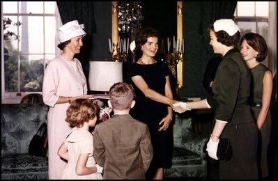Jacqueline Kennedy greets the wives of astronauts, America's newest heroes and explorers, in the Green Room May 8, 1961.