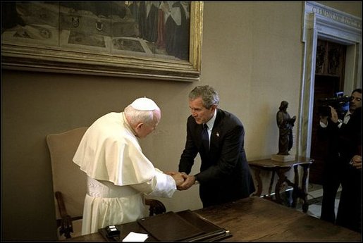 President Bush visits His Excellency Pope John Paul II at Vatican City May 28. White House photo by Eric Draper.