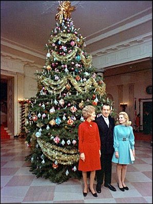 The 1969 Nixon tree featured velvet and satin balls representing each of the 50 states made by disabled workers in Florida. The ornaments were embossed with the flower of each state.