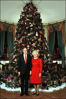 The 1991 Bush tree featured needlepoint tree ornaments, red glass balls, a turn-of-the-century needlepoint village and needlepoint figurines from Noah's Ark.