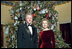 The 1998 Clinton tree was based on the theme "A Winter Wonderland." The tree featured fabric snowmen ornaments, knitted mittens and hats, and painted wooden ornaments.