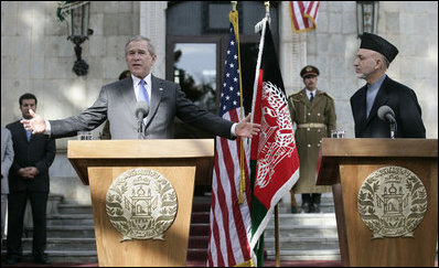 President George W. Bush gestures as he speaks during a press availability Wednesday, March 1, 2006, with Afghanistan President Hamid Karzai at the Presidential Palace in Kabul. "One of the messages I want to say to the people of Afghanistan," President Bush said, "is it's our country's pleasure and honor to be involved with the future of this country."