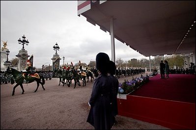 The Household Cavalry of Buckingham Palace parade by the review stand during the ceremonial welcome at Buckingham Palace in London, Wednesday, Nov. 19, 2003. Household Troops have been serving the Royal Family since 1660. White House photo by Eric Draper