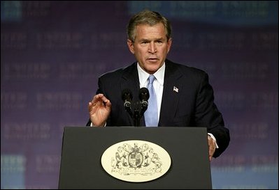 President George W. Bush speaks about Iraq and the war on terror at The Banqueting House in London Wednesday, Nov. 19, 2003. 'We did not charge hundreds of miles into the heart of Iraq and pay a bitter cost of casualties, and liberate 25 million people, only to retreat before a band of thugs and assassins,' said the President. 'We will help the Iraqi people establish a peaceful and democratic country in the heart of the Middle East. And by doing so, we will defend our people from danger.' White House photo by Paul Morse