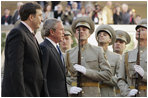 Troops stand at attention as President George W. Bush and Georgian President Mikhail Saakashvili  review the troops during an arrival ceremony  in Tiblisi Tuesday, May 10, 2005.