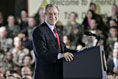 President Bush smiles broadly while addressing troops Wednesday, Feb. 24, 2005, at Wiesbaden Army Air Field in Wiesbaden, Germany.