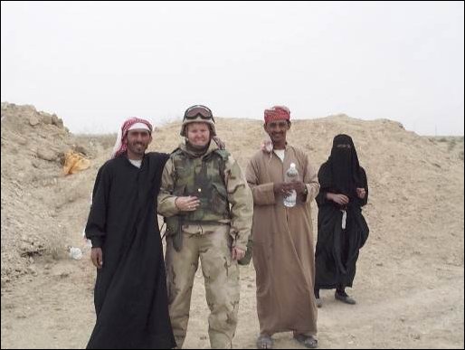 Free Iraqis with Maj. K.A. Hoard of the 1st Marine Expeditionary Force.