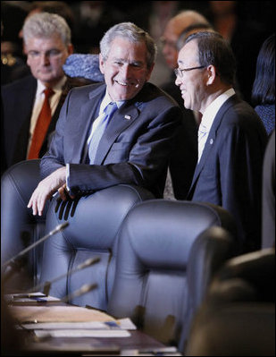 President George W. Bush speaks with United Nations Secretary-General Ban Ki-moon Thursday, April 3, 2008, during the 2008 NATO Summit in Bucharest.