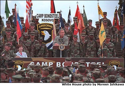 Photo of the President visiting troops in Kosovo. White House photo by Moreen Ishikawa.