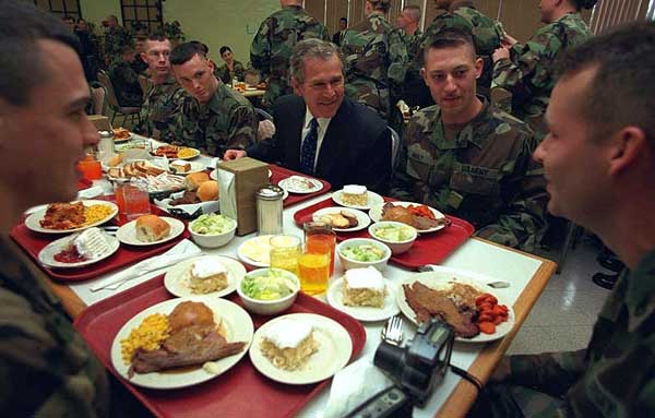 President George W. Bush has lunch with troops at Ft. Stewart in Savannah, Georgia on Tuesday February 12, 2001