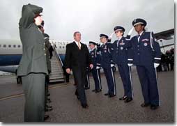President George W. Bush is saluted as he arrives at Yeager Field to visit the 130th Air Lift Wing of the Air National Guard in Charleston, West Virginia on February 14, 2001. President Bush visited several military bases last week to reaffirm his commitment to helping the people who serve in America's armed forces. (WHITE HOUSE PHOTO BY PAUL MORSE)