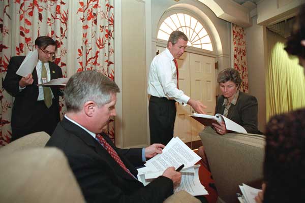 President George W. Bush holds meetings with advisors to discuss the budget plan